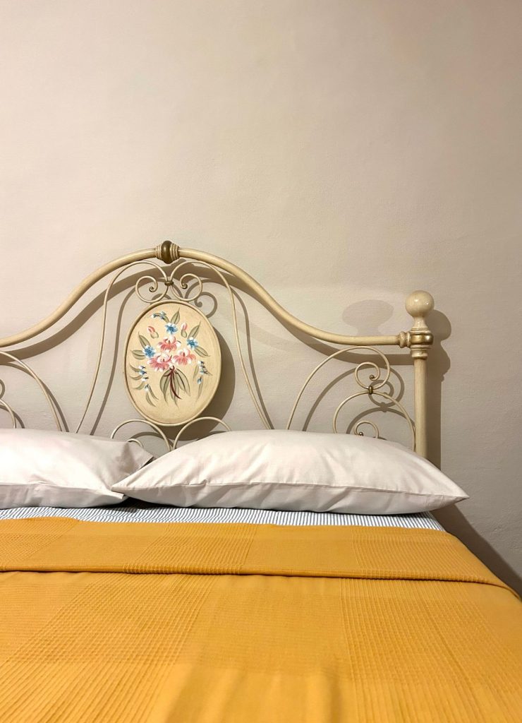Žlutý pokoj v apartmánu Casa d'Arte